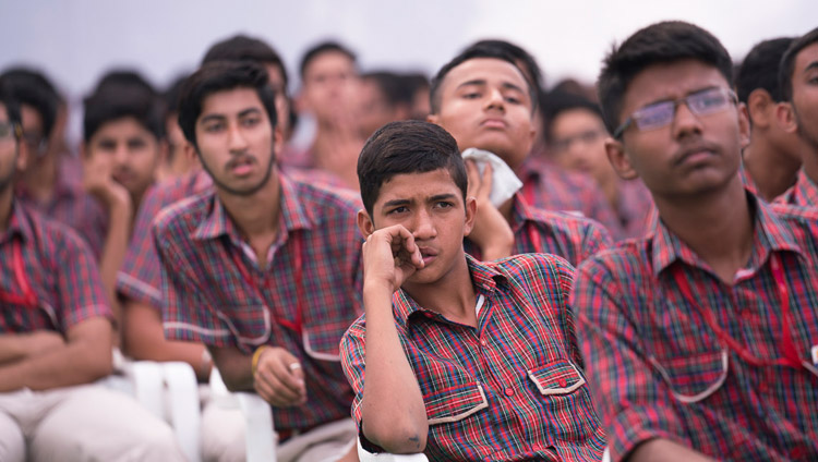 Students attending the launch of the Universal Ethics Curriculum listening to His Holiness the Dalai Lama at CJ DAV Public School in Meerut, UP, India on October 16, 2017. Photo by Tenzin Choejor