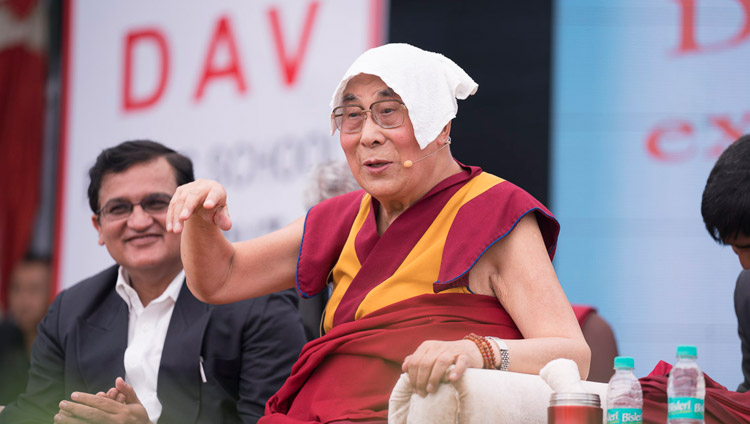 His Holiness the Dalai Lama speaking at the launch of a curriculum prepared by Ayurgyan Nyas introducing training in Universal Ethics at CJ DAV Public School in Meerut, UP, India on October 16, 2017. Photo by Tenzin Choejor