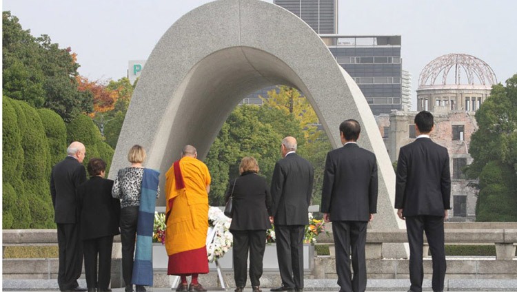 His Holiness the Dalai Lama and fellow Nobel Laureates paying their respects at Hiroshima Memorial Park in Hiroshima, Japan on November 14, 2010. Photo by Taikan Usui