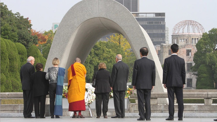 Nobel Laureates including His Holiness the Dalai Lama paying respect at the Hiroshima Peace Memorial in Hiroshima, Japan on November 14th, 2010. Photo by Taikan Usui