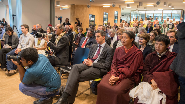 Members of the audience listening to the interfaith dialogue with His Holiness the Dalai Lama at the House of Religions in Bern, Switzerland on October 12, 2016. Photo/Manuel Bauer