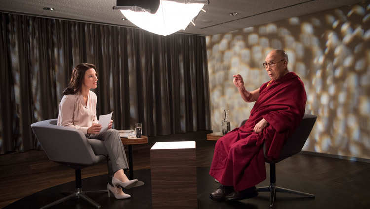 His Holiness the Dalai Lama giving an interview to Amira Hafner-Al Jabaji for the Swiss National TV programme Sternstunde Philosophie in Bern, Switzerland on October 13, 2016. Photo/Manuel Bauer