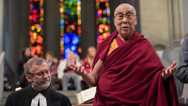 His Holiness the Dalai Lama addressing the inter-faith prayer meeting at Grossmuenster Church in Zurich Switzerland on October 15, 2016. Photo/Manuel Bauer