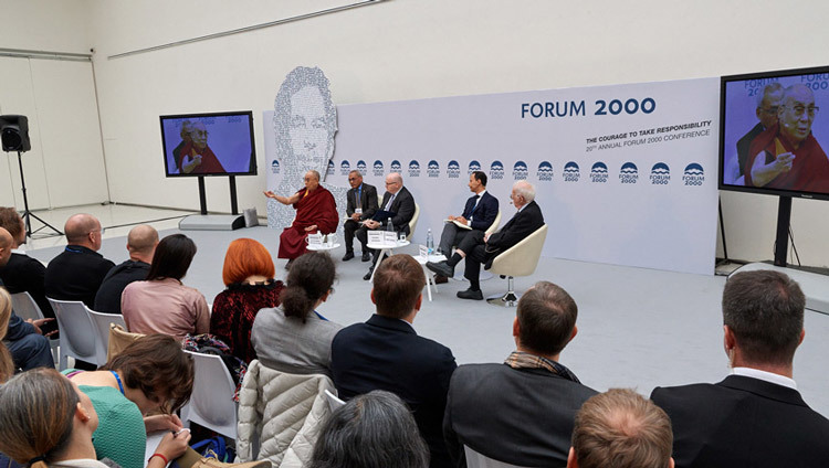 His Holiness the Dalai Lama speaking at a Forum 2000 panel on The Paradox of Religion in Prague, Czech Republic on October 18, 2016. Photo/Olivier Adam