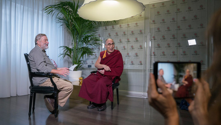 His Holiness the Dalai Lama and and Pio d'Emilia for SkyTG 24 enjoying a light moment before their interview in Milan, Italy on October 21, 2016. Photo/Tenzin Choejor/OHHDL