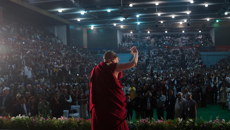 His Holiness the Dalai Lama waving to the crowd on his arrival at Thyagaraj Stadium in New Delhi, India on December 9, 2016. Photo/Tenzin Choejor/OHHDL