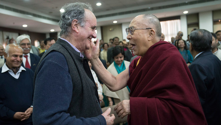 His Holiness the Dalai Lama greeting his old friend, former BBC New Delhi Bureau Chief Mark Tully on his arrival at the Vivekananda International Foundation in New Delhi, India on February 8, 2017. Photo/Tenzin Choejor/OHHDL