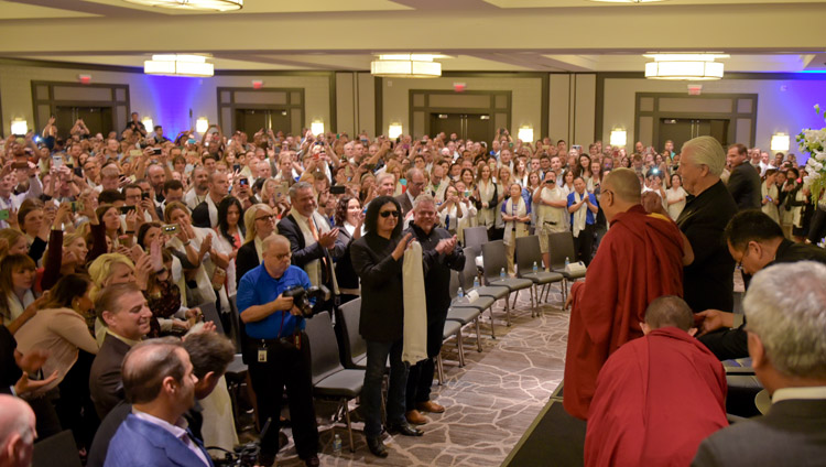 Over 2000 Starkey employees welcoming His Holiness the Dalai Lama as he arrives for an interactive session at Starkey Hearing Technologies in Minneapolis, MN, USA on June 22, 2017. Photo by Starkey Hearing Foundation