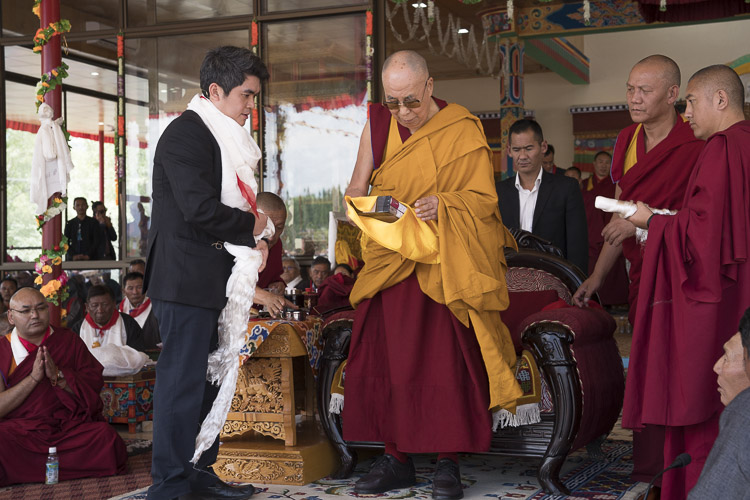 His Holiness the Dalai Lama and translator and editor Jamyang Rinchen releasing the Chinese language version of 'Science and Philosophy in Indian Buddhist Classics' during celebrations in honor of His Holiness the Dalai Lama's 82nd birthday at the Shiwatsel teaching ground in Leh, Ladakh, J&K, India on July 6, 2017. Photo by Tenzin Choejor/OHHDL His Holiness the Dalai Lama and translator and editor Jamyang Rinchen releasing the Chinese language version of 'Science and Philosophy in Indian Buddhist Classics' during celebrations in honor of His Holiness the Dalai Lama's 82nd birthday at the Shiwatsel teaching ground in Leh, Ladakh, J&K, India on July 6, 2017. Photo by Tenzin Choejor/OHHDL