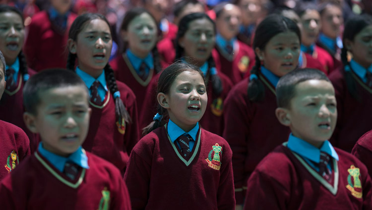 Children from Lamdon School performing the Indian and Tibetan national anthems at the start of the closing ceremony of the Great Summer Debate at the teaching ground in Disket, Nubra Valley, J&K, India on July 10, 2017. Photo by Tenzin Choejor/OHHDL