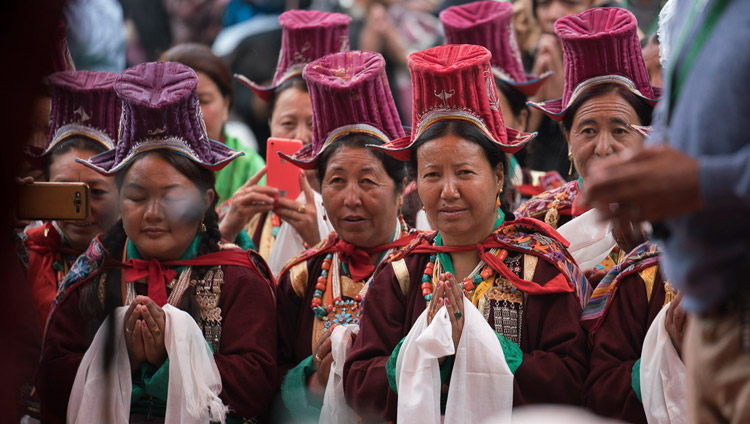 Ladakhi women in traditional dress watching as His Holiness the Dalai Lama departs at the conclusion of the second day of his teachings in Disket, Nubra Valley, J&K, India on July 12, 2017. Photo by Tenzin Choejor/OHHDL