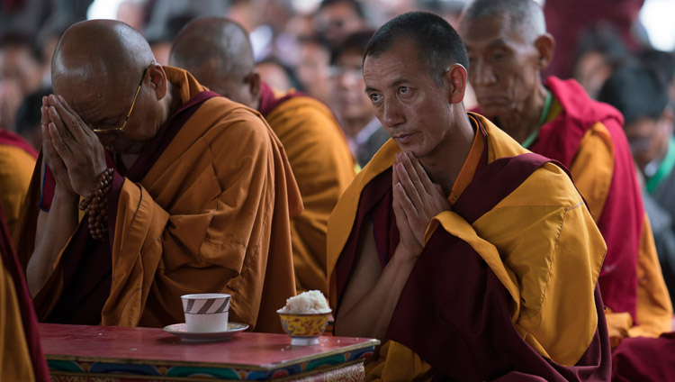 Monks watching as His Holiness the Dalai Lama conducts preliminary rituals on the final day of his teachings in Disket, Nubra Valley, J&K, India on July 13, 2017. Photo by Tenzin Choejor/OHHDL