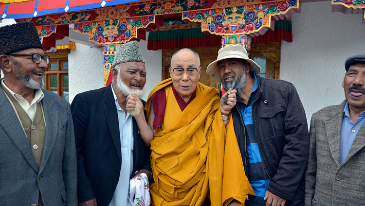 His Holiness the Dalai Lama playfully posing with Muslim representatives during his visit Anjuman Moen-Ul-Islam school in Padam, Zanskar, J&K, India on July 18, 2017. Photo by Lobsang Tsering/OHHDL