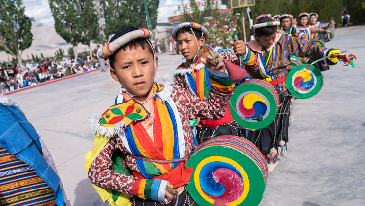 Members of the dance troupe lined up waiting to welcome His Holiness the Dalai Lama on his arrival at Tibetan Childrens' Village School Choglamsar in Leh, Ladakh, J&K, India on July 25, 2017. Photo by Tenzin Choejor/OHHDL