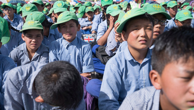 TCV students listening to His Holiness the Dalai Lama during his visit to Tibetan Childrens' Village School Choglamsar in Leh, Ladakh, J&K, India on July 25, 2017. Photo by Tenzin Choejor/OHHDL