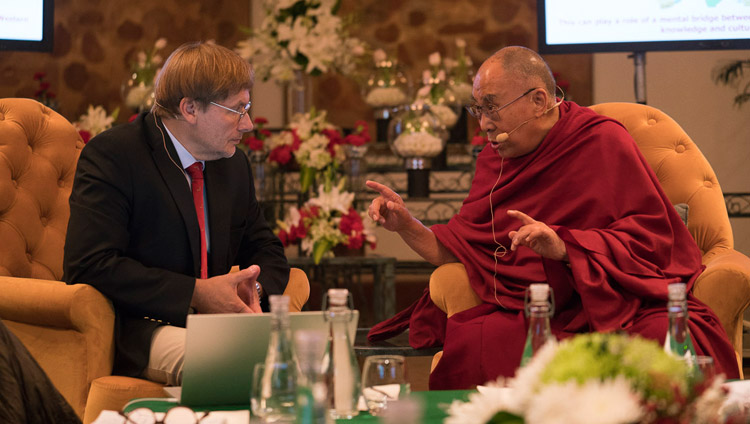 His Holiness the Dalai Lama delivering his opening remarks at the dialogue between Russian and Buddhist scholars in New Delhi, India on August 7, 2017. Photo by Tenzin Choejor/OHHDL