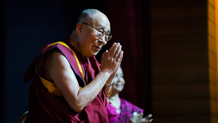 His Holiness the Dalai Lama paying respects to the audience after being introduced before delivering the Rajendra Mathur Memorial Lecture in New Delhi, India on August 9, 2017. Photo by Tenzin Choejor/OHHDL 