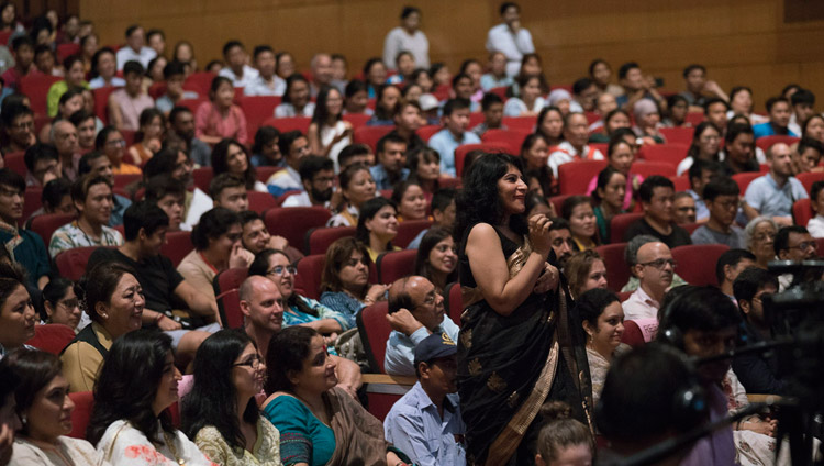 A member of the audience asking His Holiness the Dalai Lama a question during his talk at the Siri Fort Auditorium in New Delhi, India on August 10, 2017. Photo by Tenzin Choejor/OHHDL A member of the audience asking His Holiness the Dalai Lama a question during his talk at the Siri Fort Auditorium in New Delhi, India on August 10, 2017. Photo by Tenzin Choejor/OHHDL