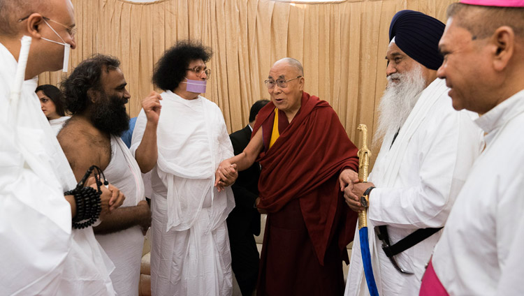 His Holiness the Dalai Lama is welcomed by Acharya Dr. Lokesh Muni and other religious leaders on his arrival at the National Sports Club of India Dome in Mumbai, India on August 13, 2017. Photo by Tenzin Choejor/OHHDL His Holiness the Dalai Lama is welcomed by Acharya Dr. Lokesh Muni and other religious leaders on his arrival at the National Sports Club of India Dome in Mumbai, India on August 13, 2017. Photo by Tenzin Choejor/OHHDL