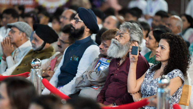 Members of the audience listening to His Holiness the Dalai Lama speaking at the interfaith dialogue in Mumbai, India on August 13, 2017. Photo by Tenzin Choejor/OHHDL