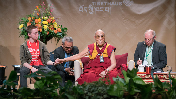 His Holiness the Dalai Lama answering questions from students during their dialogue at the Jahrhunderthalle in Frankfurt, Germany on September 13, 2017. Photo by Tenzin Choejor