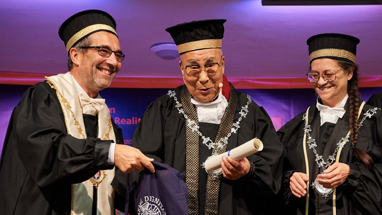 His Holiness the Dalai Lama receiving the Master’s Degree Honoris Causa in Clinical and Health Psychology at the University of Pisa in Pisa, Italy on September 21, 2017. Photo by Olivier Adam