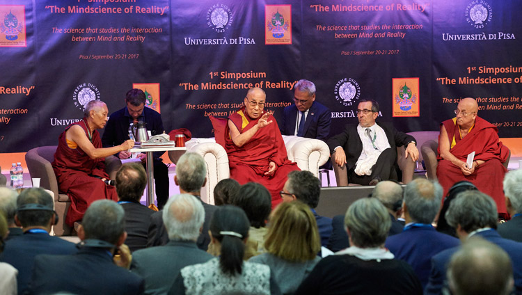 His Holiness the Dalai Lama commenting on the presentations during the second session of the MindScience Symposium at the University of Pisa in Pisa, Italy on September 21, 2017. Photo by Olivier Adam