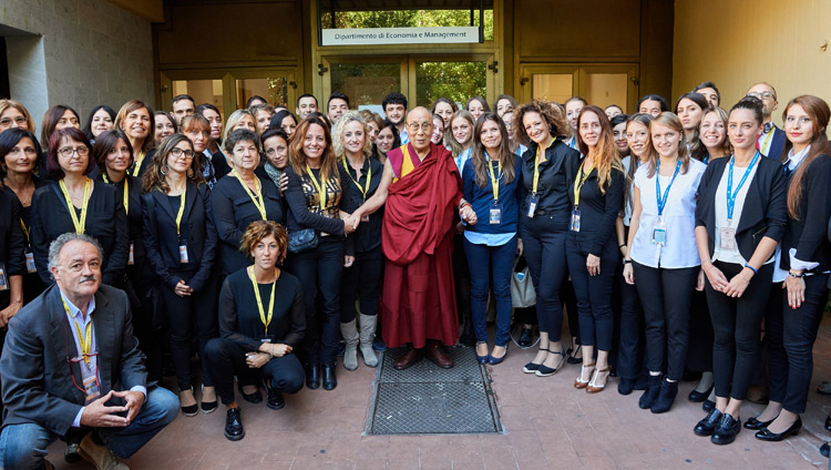 His Holiness the Dalai Lama with volunteers who helped during the two days of programs at the Pisa Congress Hall at the University of Pisa in Pisa, Italy on September 21, 2017. Photo by Olivier Adam