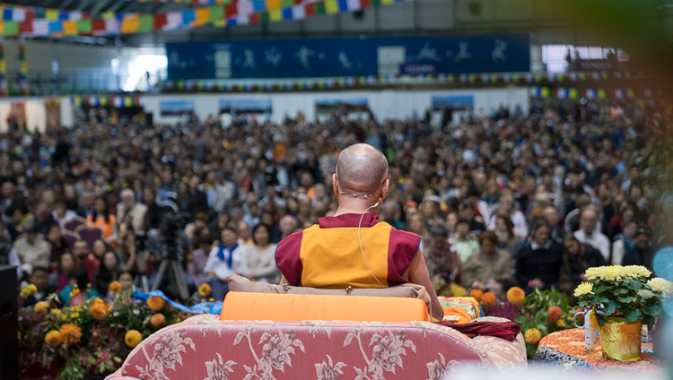 A view from the back of the stage on the second day of His Holiness the Dalai Lama's teachings at Skonto Hall in Riga, Latvia on September 24, 2017. Photo by Tenzin Choejor