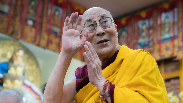 His Holiness the Dalai Lama waving at the audience on his arrival at the Tsuglagkhang on the second day of his teachings in Dharamsala, HP, India on October 4, 2017. Photo by Tenzin Choejor