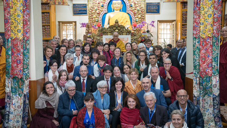 His Holiness the Dalai Lama with a group from Italy during group photos with supporters of the new Namgyal Monastery school at the conclusion of his teaching at the Main Tibetan Temple in Dharamsala, HP, India on November 3, 2017. Photo by Tenzin Choejor