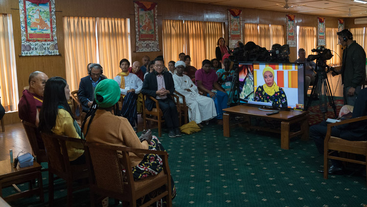 His Holiness the Dalai Lama USIP Youth Leaders Aluel Atem from South Sudan and Paula Porras from Colombia participating online in an episode of ‘The Stream’, a TV show on Al Jazeera English at his residence in Dharamsala, HP, India on November 7, 2017. Photo by Tenzin Choejor