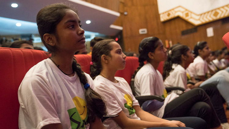 Students in the audience listening to His Holiness the Dalai Lama speaking at the NCUI Auditorium in New Delhi, India on November 19, 2017. Photo by Tenzin Choejor