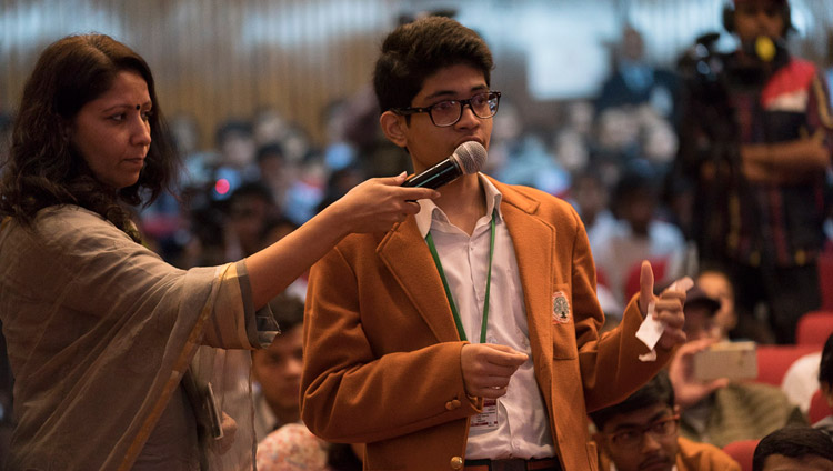 A student asking His Holiness the Dalai Lama a question during his talk hosted by the Smile Foundation at the NCUI Auditorium in New Delhi, India on November 19, 2017. Photo by Tenzin Choejor