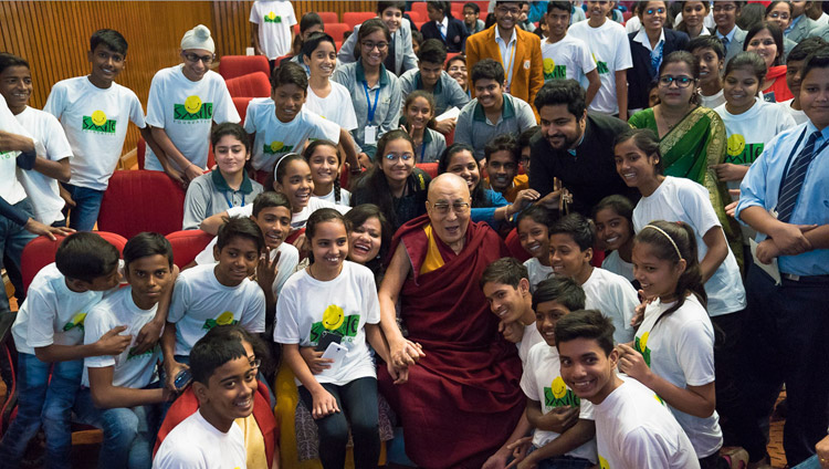 His Holiness the Dalai Lama with students supported by the Smile Foundation after his talk at the NCUI Auditorium in New Delhi, India on November 19, 2017. Photo by Tenzin Choejor