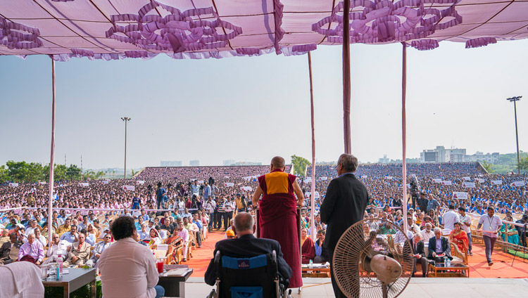 His Holiness the Dalai Lama speaking to a crowd of over 25,000 students at KISS University in Bhubaneswar, Odisha, India on November 21, 2017. Photo by Tenzin Choejor