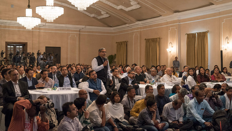 A member of the audience asking His Holiness the Dalai Lama a question during his talk in Kolkata, India on November 23, 2017. Photo by Tenzin Choejor