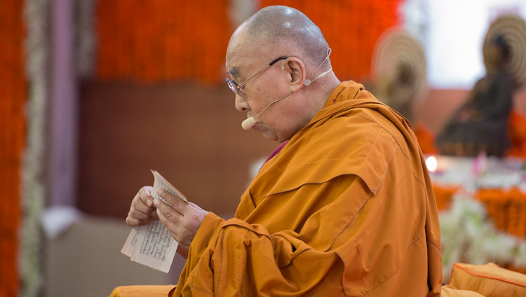 His Holiness the Dalai Lama reading from the text on the second day of his teachings at Somaiya Vidyavihar Campus Auditorium in Mumbai, India on December 9, 2017. Photo by Lobsang Tsering His Holiness the Dalai Lama reading from the text on the second day of his teachings at Somaiya Vidyavihar Campus Auditorium in Mumbai, India on December 9, 2017. Photo by Lobsang Tsering