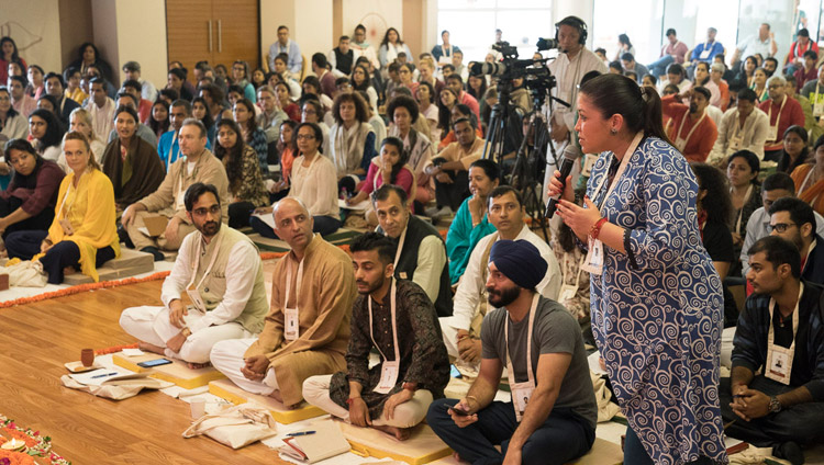 A member of the audience asking His Holiness the Dalai Lama a question on the second day of teachings at Somaiya Vidyavihar Campus Auditorium in Mumbai, India on December 9, 2017. Photo by Lobsang Tsering