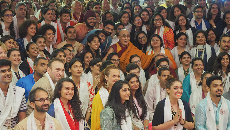 His Holiness the Dalai Lama posing for a group photo with the young people who attended his teaching at Somaiya Vidyavihar Campus Auditorium in Mumbai, India on December 9, 2017. Photo by Jeremy Russell