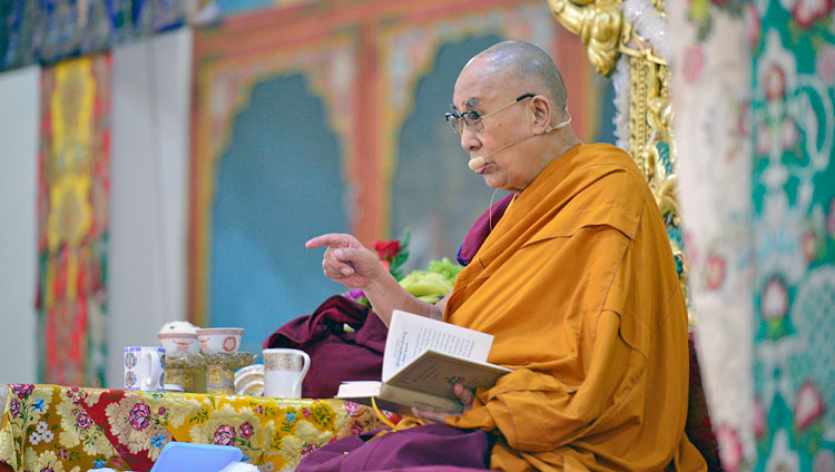 His Holiness the Dalai Lama commenting on the text "Three Principal Aspects of the Path" during his teaching at Ganden Lachi Monastery in Mundgod, Karnataka, India on December 17, 2017. Photo by Lobsang Tsering