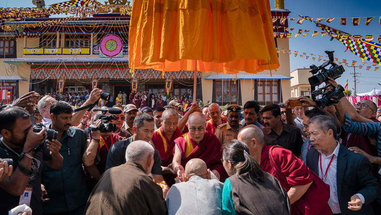 His Holiness the Dalai Lama greeting members of the Tibetan community on his arrival at Sera Lachi Monastery in  Bylakuppe, Karnataka, India on December 19, 2017. Photo by Tenzin Choejor