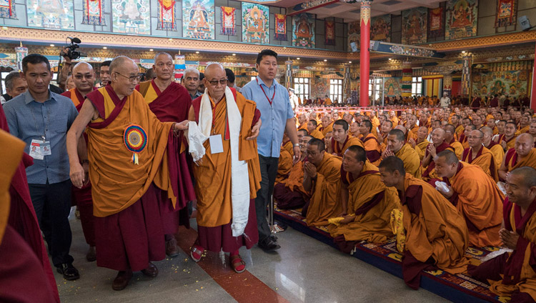 His Holiness the Dalai Lama arriving at Namdroling Monastery Assembly Hall to participate in the Seventh Convocation in Bylakuppe, Karnataka, India on December 22, 2017. Photo by Tenzin Choejor