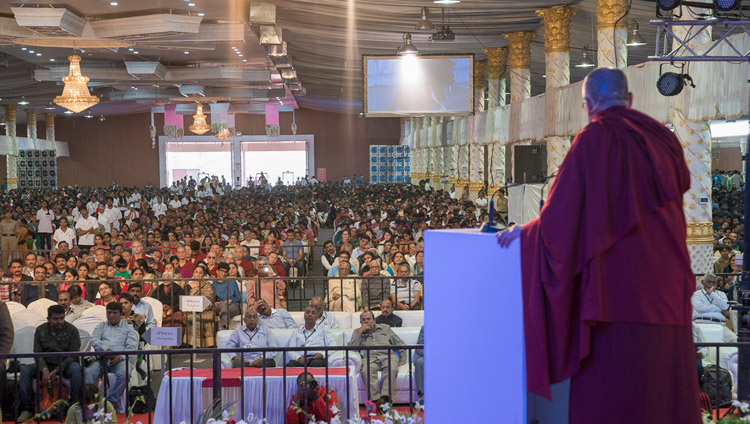 His Holiness the Dalai Lama speaking to the over 14,000 people attending Seshadripuram Group of Institutions Silver Jubilee in Bengaluru, Karnataka, India on December 24, 2017. Photo by Lobsang Tsering