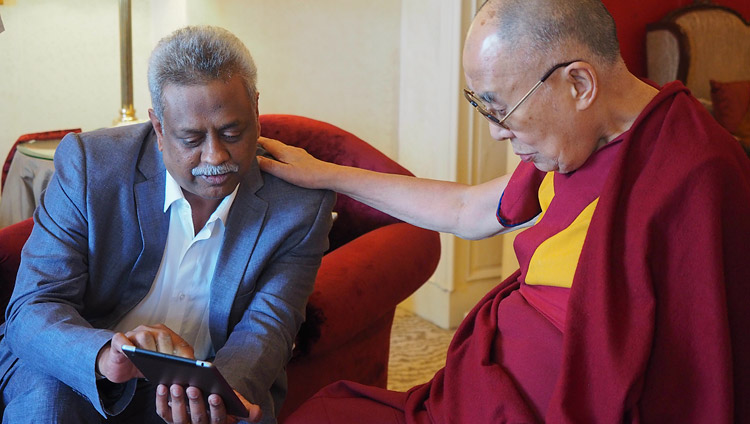 Bharath Subbarao demonstrating the new 'Mandala' app to His Holiness the Dalai Lama in Bengaluru, Karnataka, India on December 25, 2017. Photo by Jeremy Russell