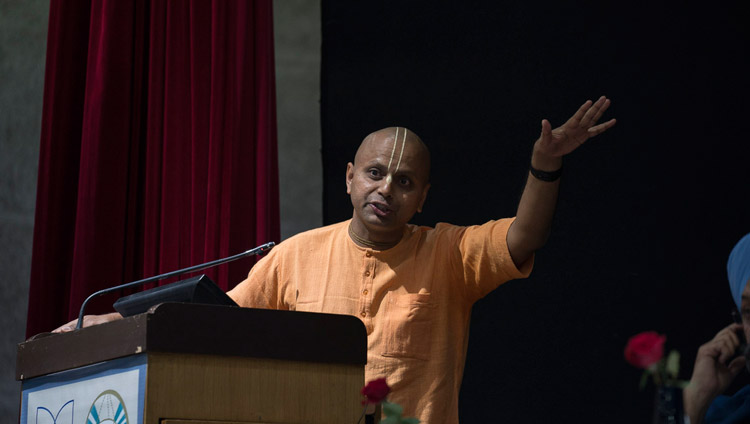 Shri Gaurgopal Das speaking at the inter-religious conference at Jawaharlal Nehru University in New Delhi, India on December 28, 2017. Photo by Tenzin Choejor