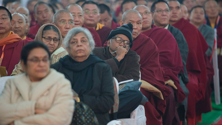 Members of the audience listening to His Holiness the Dalai Lama's opening remarks at the inaugural session of the conference on Mind in Indian Philosophical Schools of Thought and Modern Science at the Central Institute of Higher Tibetan Studies in Sarnath, Varanasi, India on December 30, 2017. Photo by Lobsang Tsering Members of the audience listening to His Holiness the Dalai Lama's opening remarks at the inaugural session of the conference on Mind in Indian Philosophical Schools of Thought and Modern Science at the Central Institute of Higher Tibetan Studies in Sarnath, Varanasi, India on December 30, 2017. Photo by Lobsang Tsering