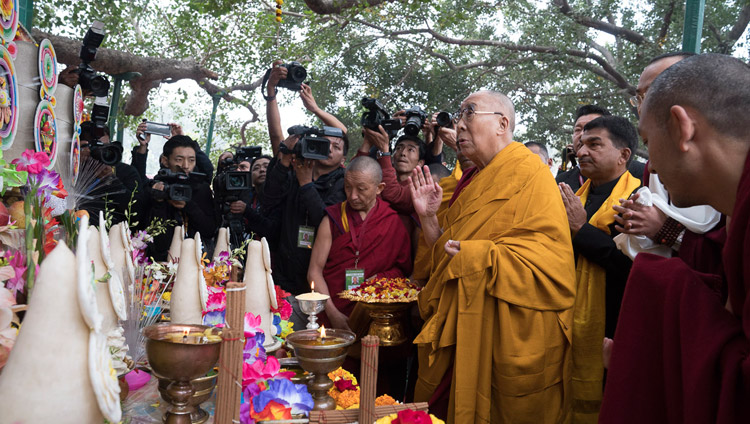 His Holiness the Dalai Lama paying his respects to an image of the Buddha on his arrival at the Mahabodhi Temple in Bodhgaya, Bihar, India on January 2, 2018. Photo by Tenzin Choejor