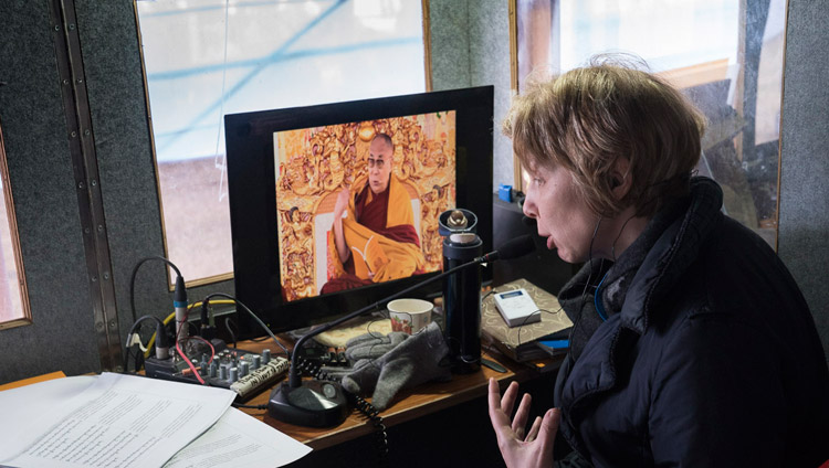 The Russian interpreter, one of 12 different translations available, working during the first day of His Holiness the Dalai Lama's teaching in Bodhgaya, Bihar, India on January 5, 2018. Photo by Lobsang Tsering