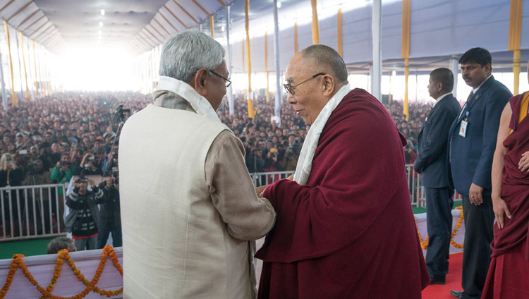 His Holiness the Dalai Lama and Bihar Chief Minister Nitish Kumar exchanging greetings at the start of the book release ceremony in Bodhgaya, Bihar, India on January 7, 2018. Photo by Lobsang Tsering